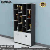 A black trophy cabinet with multiple shelves, filled with various trophies and awards.